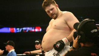 Roy Nelson срещу Junior dos Santos в UFC 117 официално